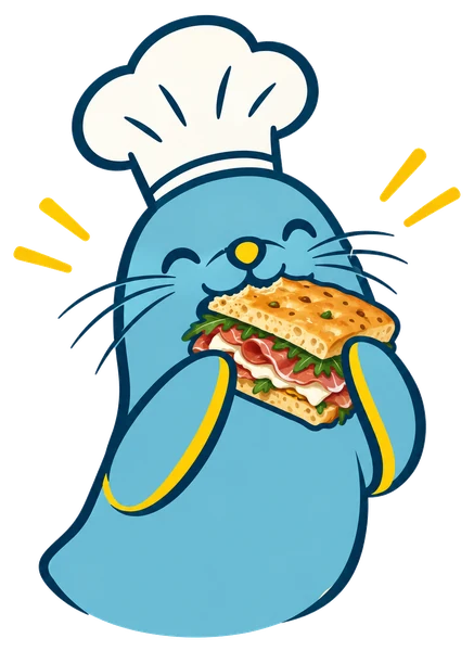 La foca con gorro de cocinero, mordiendo un sándwich de focaccia